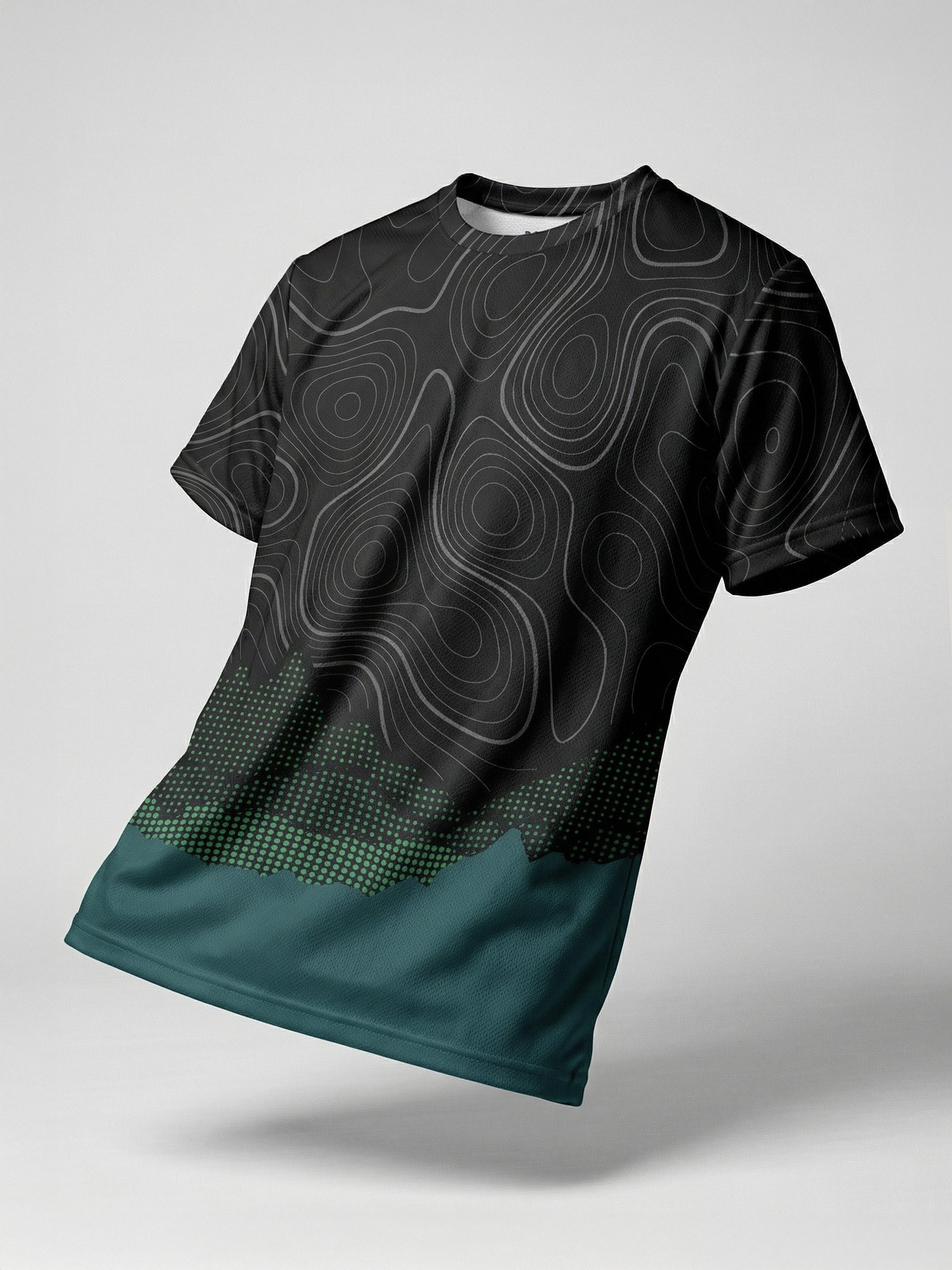 Plain product photo of a topo-print running tee on a grey background